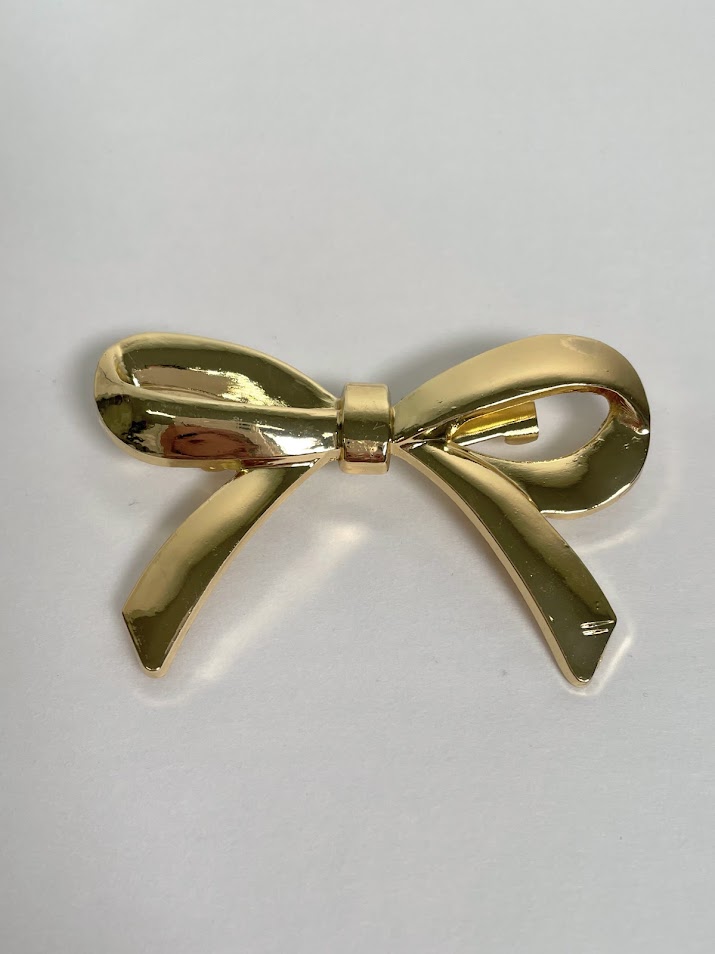 Broche lazada dorado